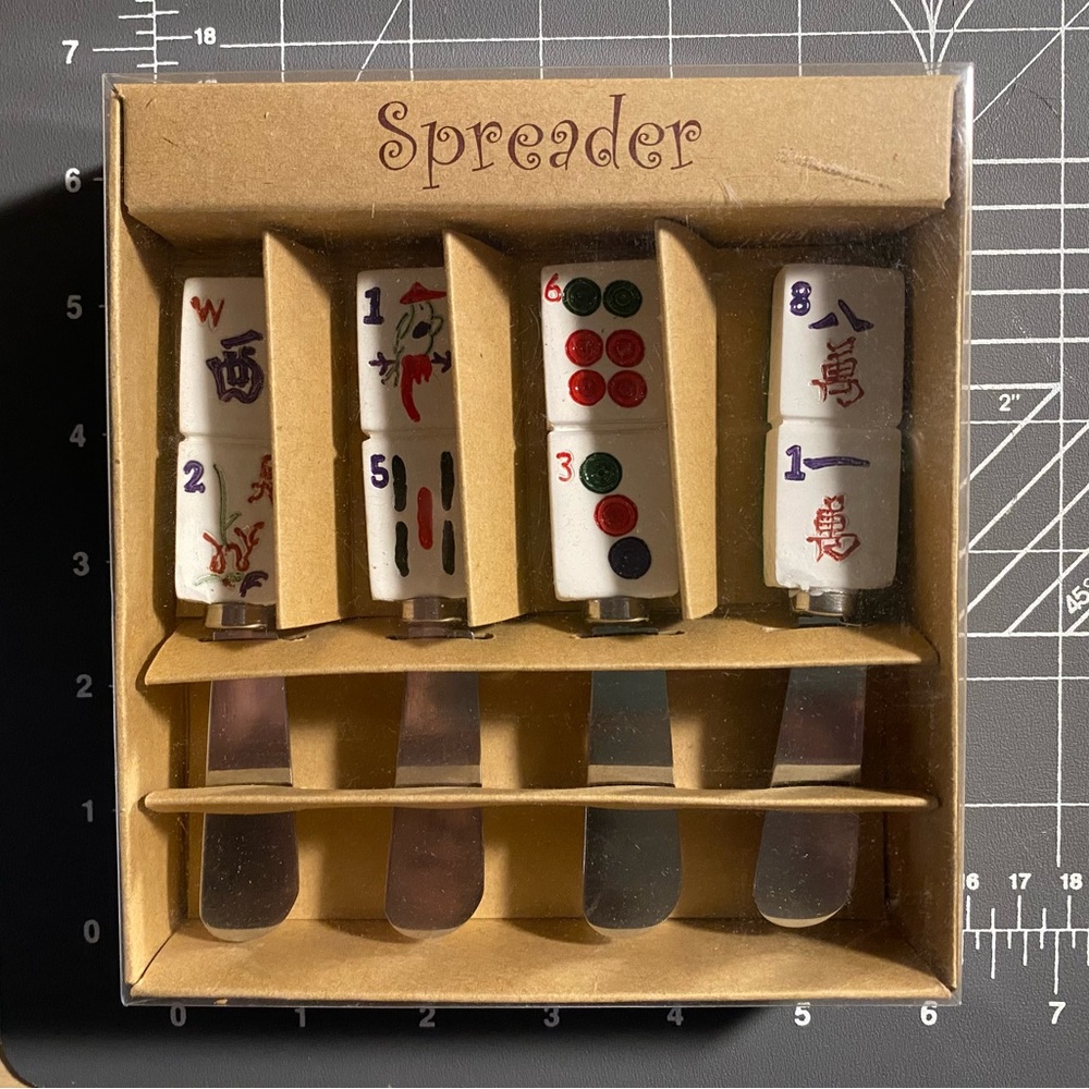 Mahjong dip spreaders